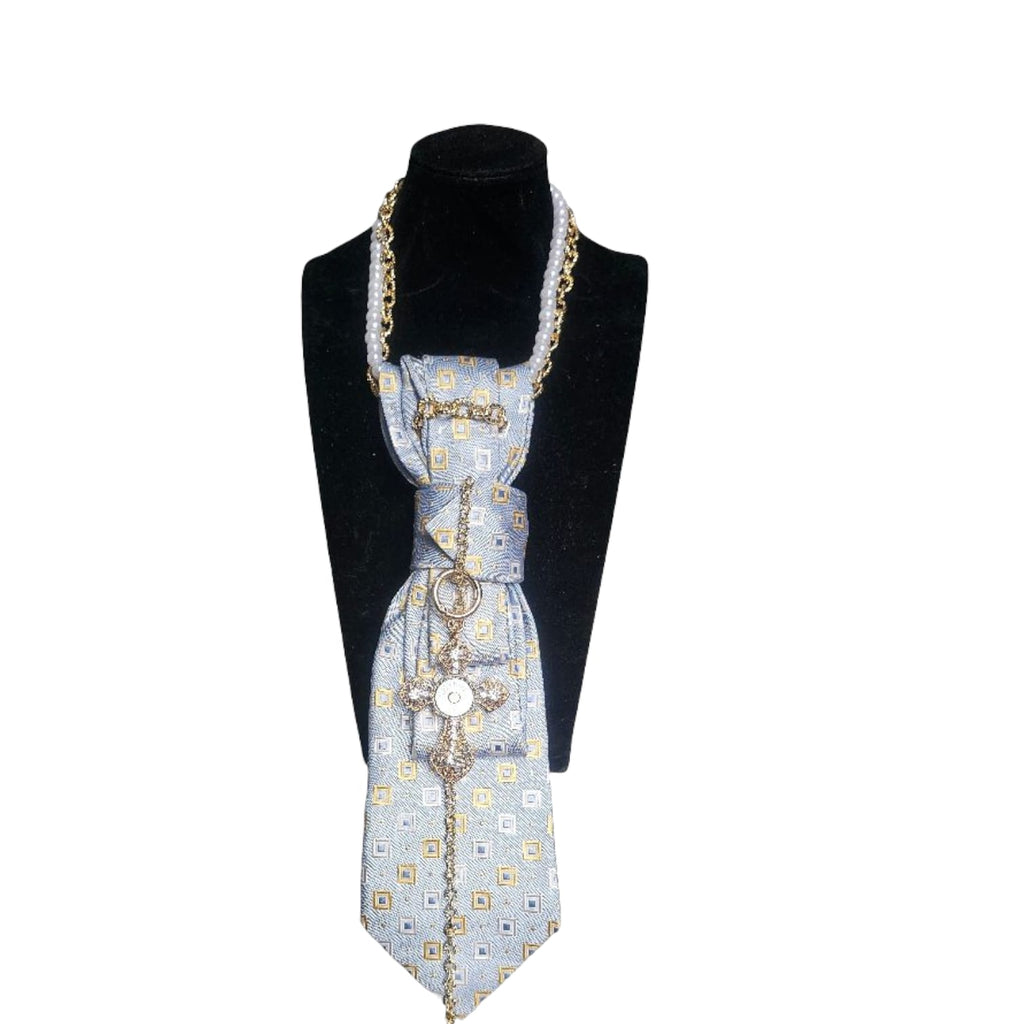Cravatta Gioiello Blue and Gold Cross su manichino visione frontale