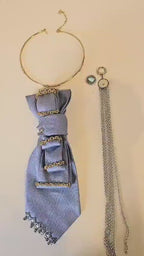 Cravatta Gioiello Marea flat lay come si compone tutorial